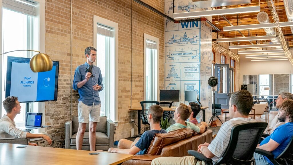Marketing team presenting a strategy in a bright loft office